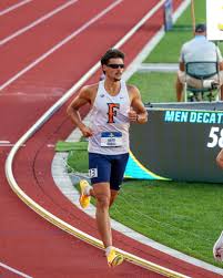 Keith Orona running in the men's decathlon at a championship meet
